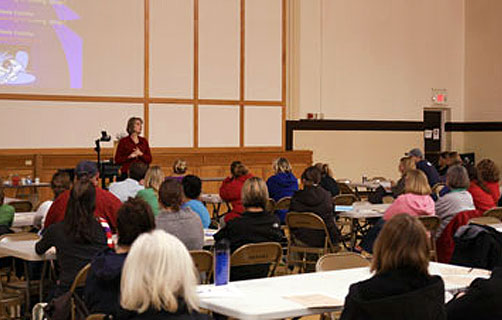 Mary conducting a workshop